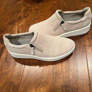 Collection by Clarks cream slip-ons